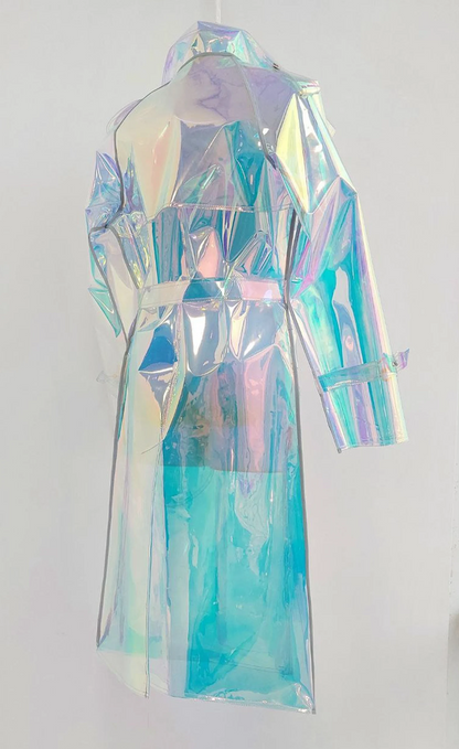 Model wearing a long holographic raincoat for men in a city setting.