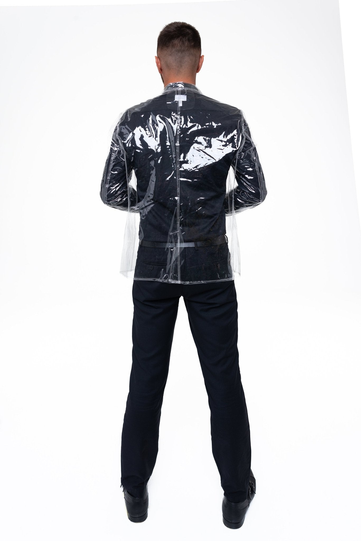 Detailed back view of the transparent vinyl blazer showing the classic vent.