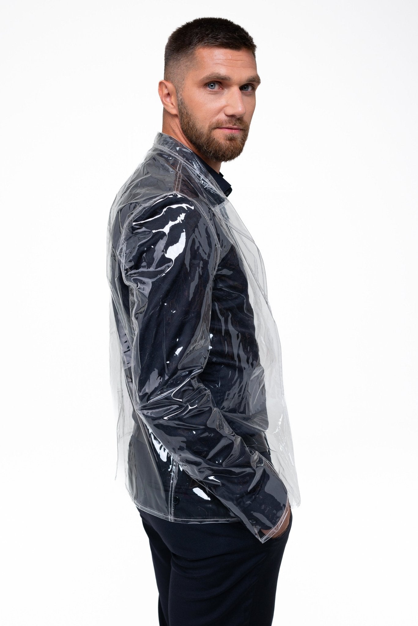 Full-body shot of the waterproof designer blazer in a clear vinyl finish.