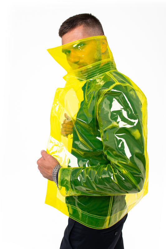Person wearing a transparent yellow raincoat on a white background