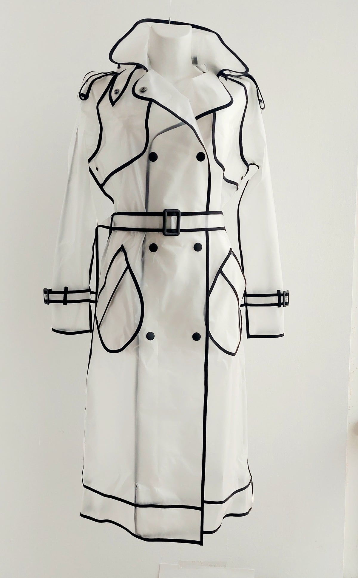 The classic translucent trenchcoat. Womans Avant-Garde Raincoat.