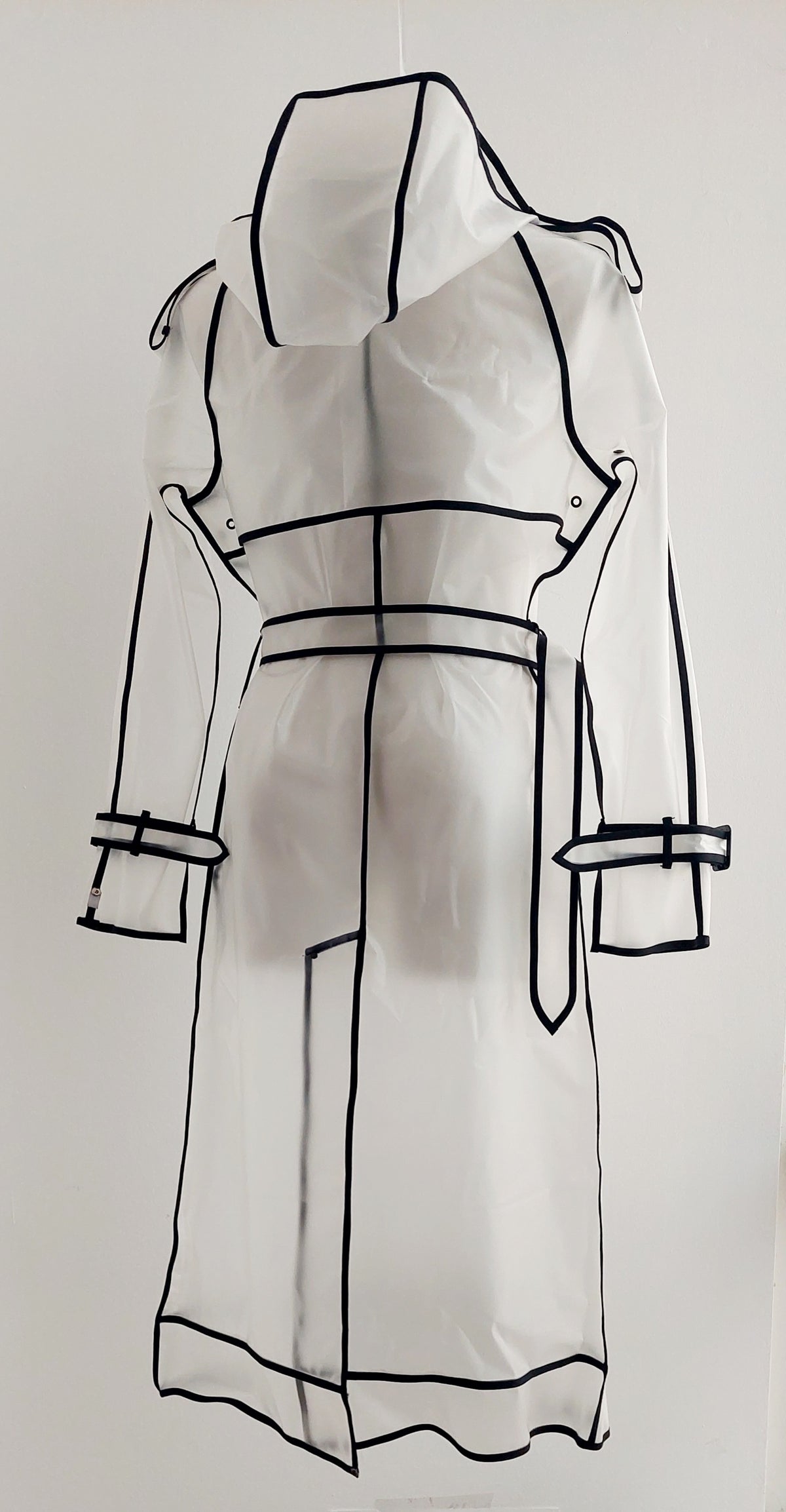 The classic translucent trenchcoat. Womans Avant-Garde Raincoat.
