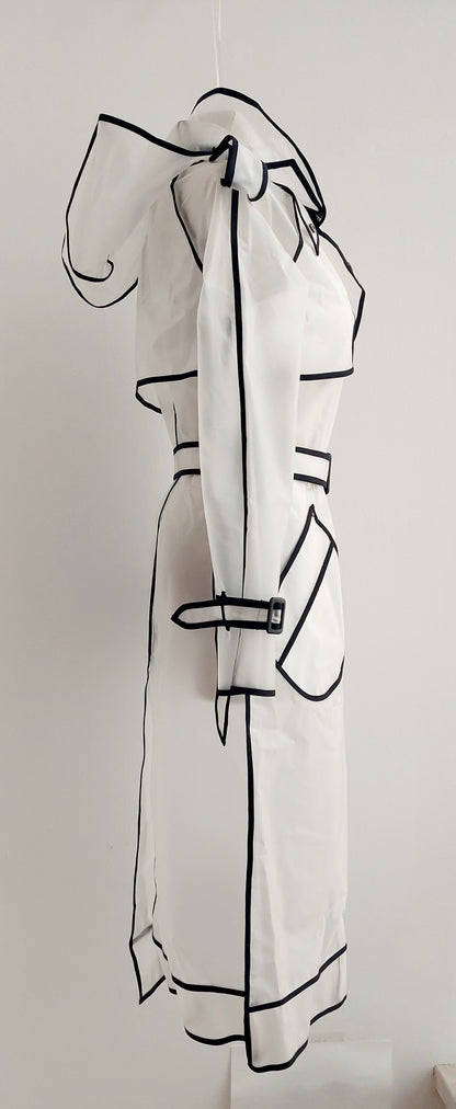 The classic translucent trenchcoat. Womans Avant-Garde Raincoat.
