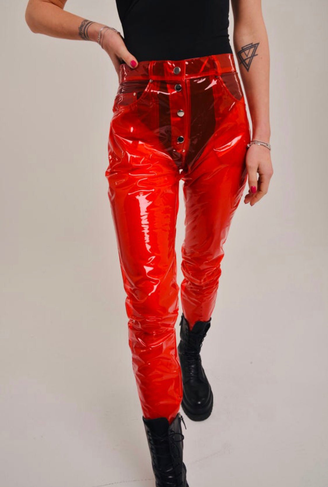 Close-up of the vibrant colored transparent TPU material on designer trousers.