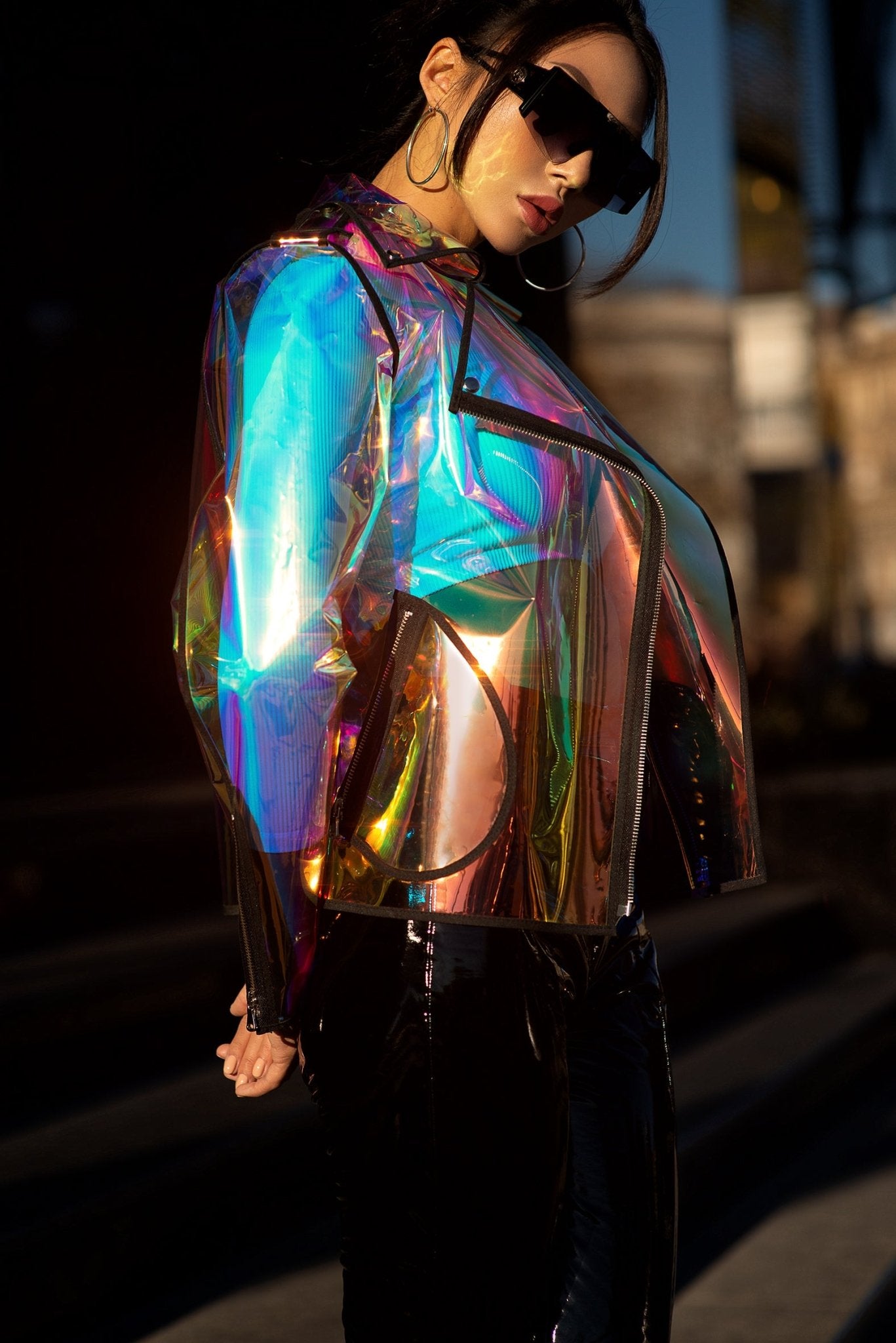Close-up of the shimmering TPU material on a holographic moto jacket.