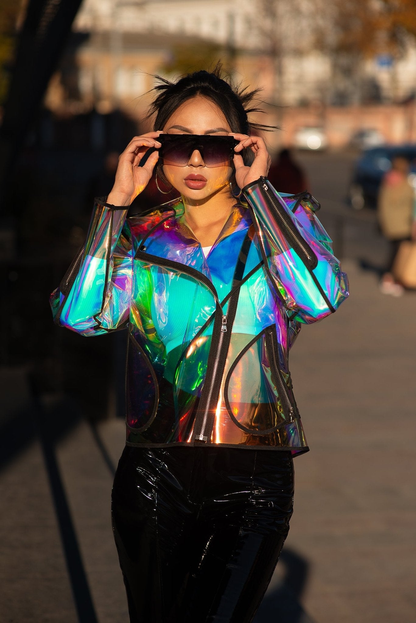 Close-up of the shimmering TPU material on a holographic moto jacket.