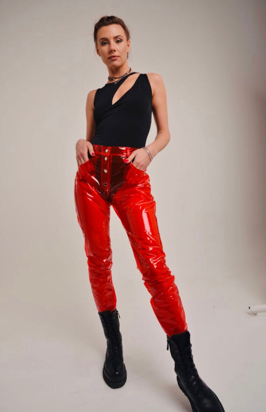 Ladies wearing colorful transparent TPU pants in a jeans-style cut by Domdrich.
